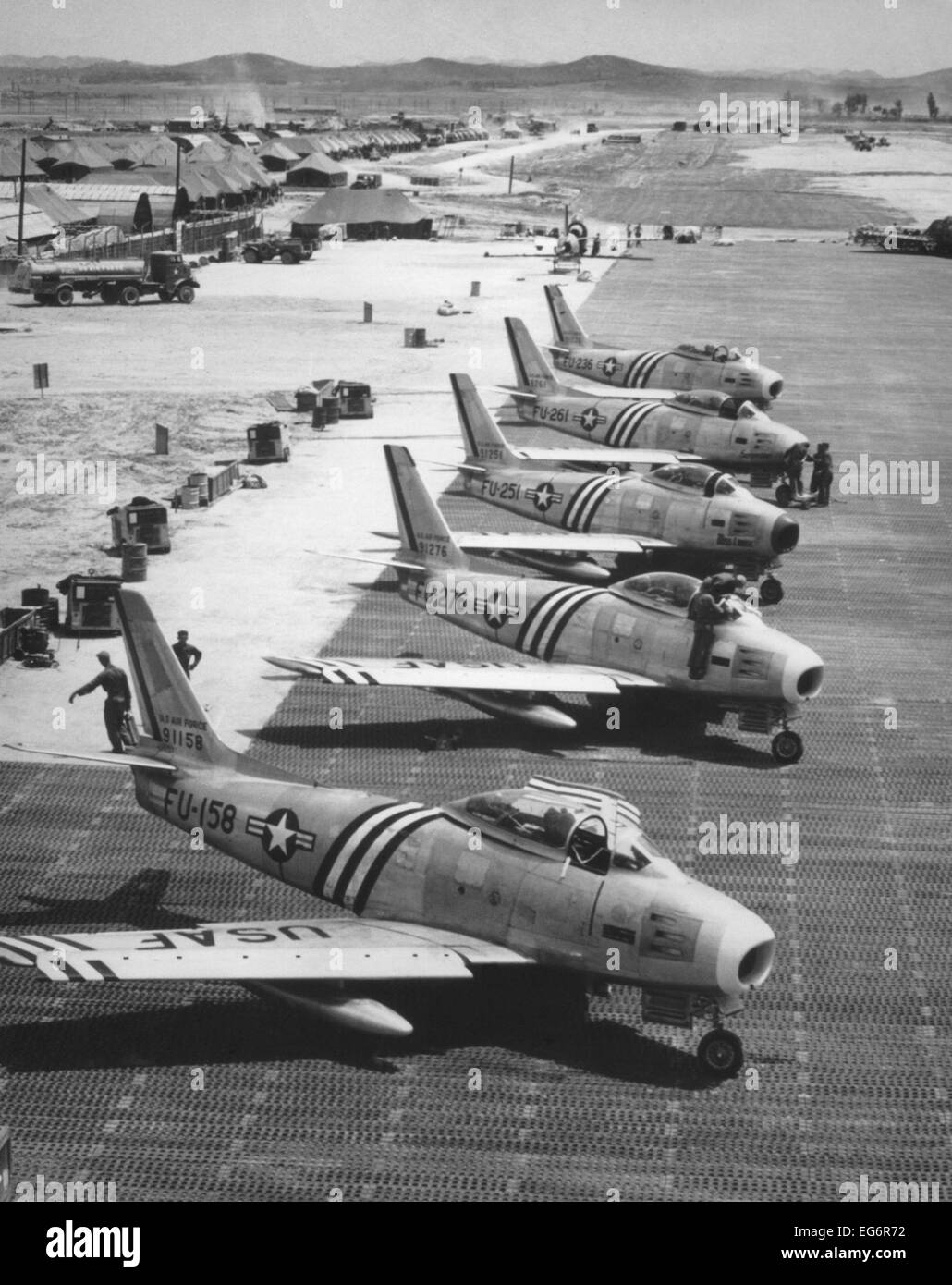 Insert image here: MiG‑15 taking off from a concrete runway; high tailplane and intake nose prominent.