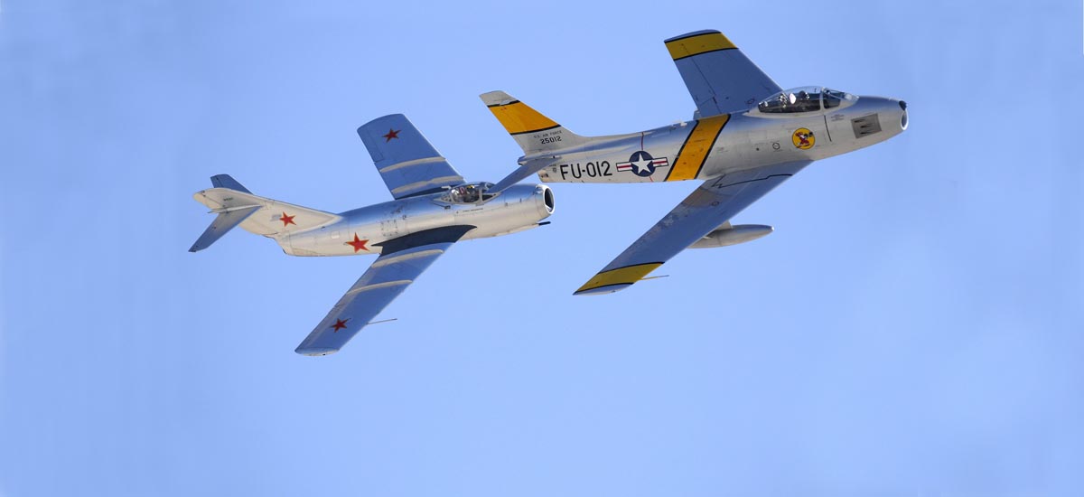 Korean War aviation showing F-86 and MiG aircraft