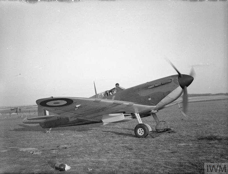 Insert image here: Wing jig with ribs and spars aligned; inspectors referencing travellers and gauge logs.